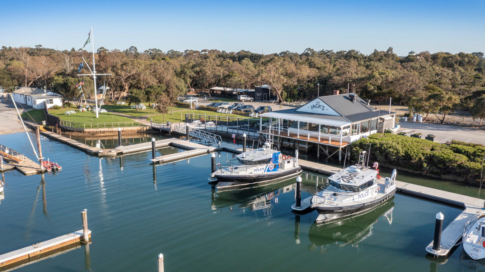 Cptn Jack’s restaurant and Hart-built police boats at Yaringa